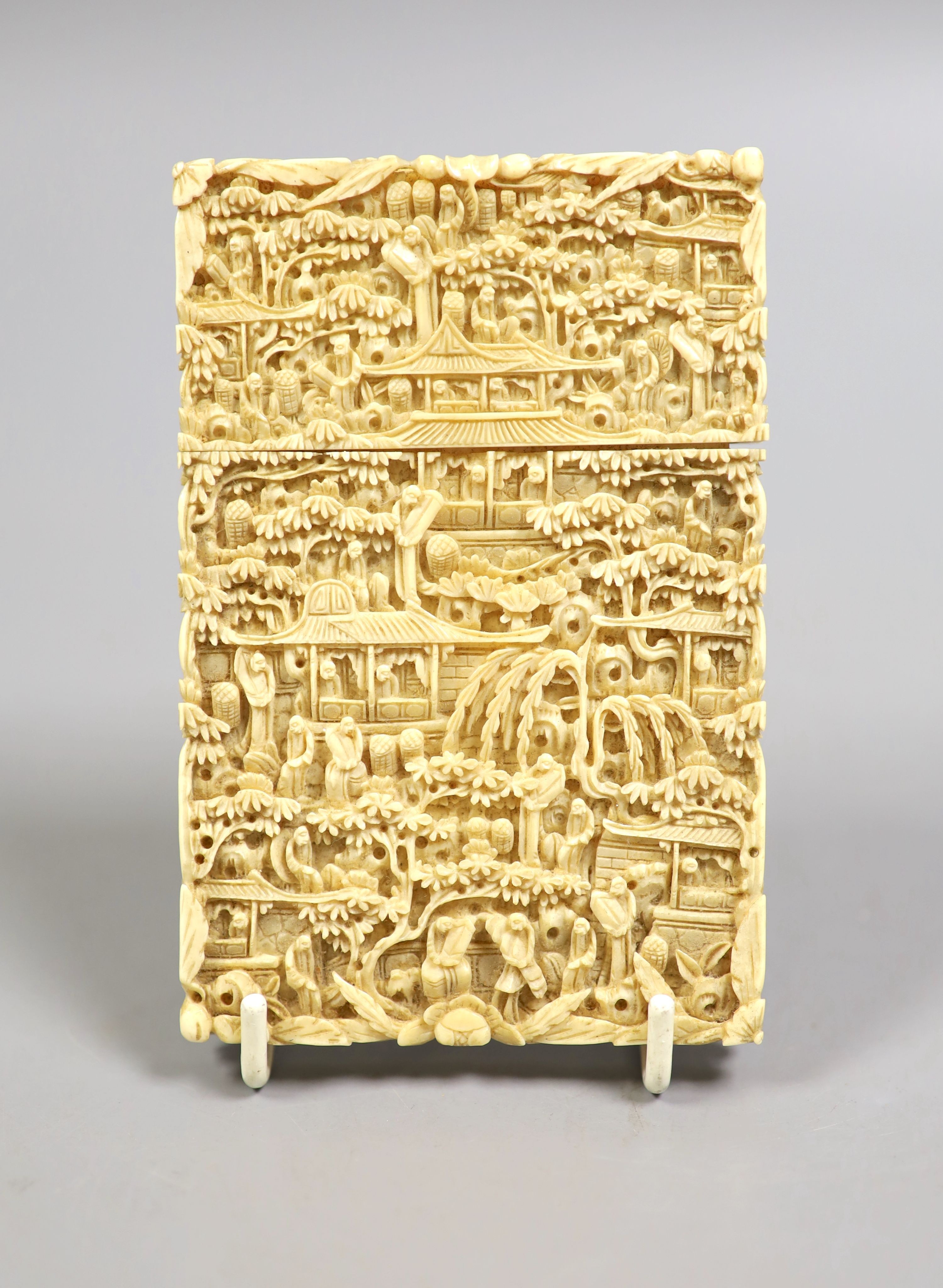 A Chinese Cantonese carved ivory card case, 11.5cm